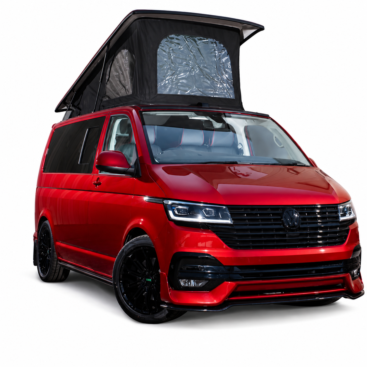 Red VW Transporter campervan with a black pop-top roof raised and full exterior styling